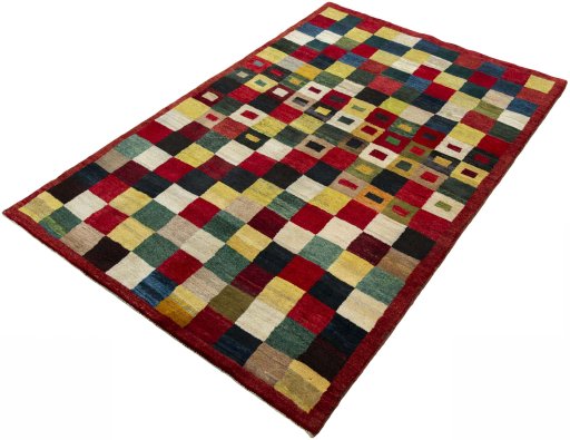 Corner detail of 2000s Persian Gabbeh rug showing border pattern and Wool pile
