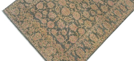 Backside of handmade New Farahan rug showing knot structure and weave density