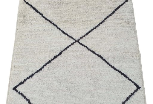 Backside of handmade New Morocco rug showing knot structure and weave density