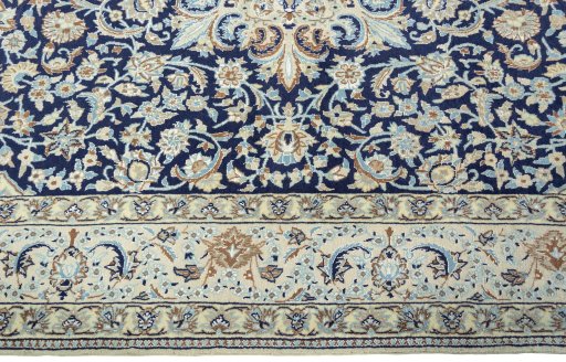Corner detail of 2000s Nain rug showing border pattern and Wool pile