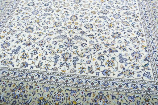 Close-up detail of 2000s Kashan rug from Iran / Persia showing Wool weave