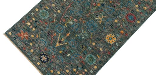 Backside of handmade New Farahan rug showing knot structure and weave density