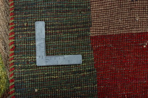 Close-up detail of 2000s Persian Gabbeh rug from Pakistan showing Wool weave