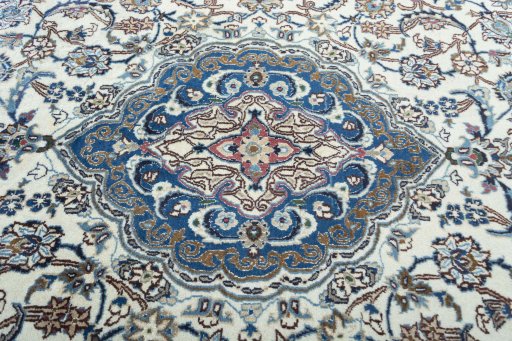 Central medallion detail of 2000s Nain rug from Iran / Persia