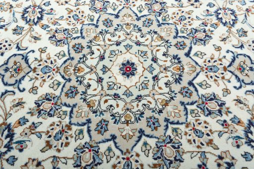 Central medallion detail of 2000s Kashan rug from Iran / Persia