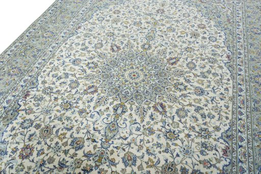 Backside of handmade New Kashan rug showing knot structure and weave density