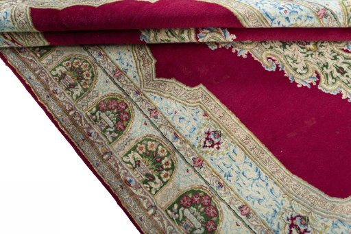 Close-up detail of 1970s Kerman rug from Iran / Persia showing Wool weave