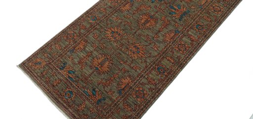 Backside of handmade New Farahan rug showing knot structure and weave density