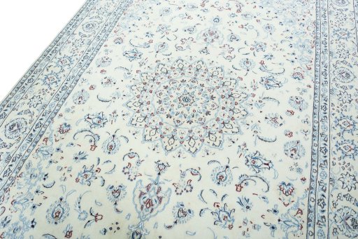 Backside of handmade New Nain rug showing knot structure and weave density