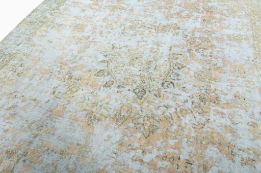 Backside of handmade 1950s Vintage rug showing knot structure and weave density