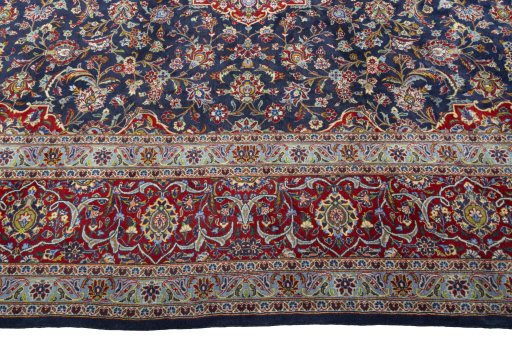 Corner detail of New Kashan rug showing border pattern and Cork pile