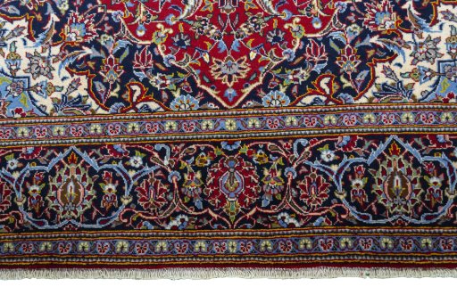 Full view of New Kashan rug from Iran / Persia, 213 × 139 cm in Red tones