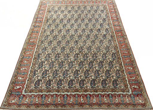 Surface texture of 1950s Ghom rug with natural Wool and intricate pattern