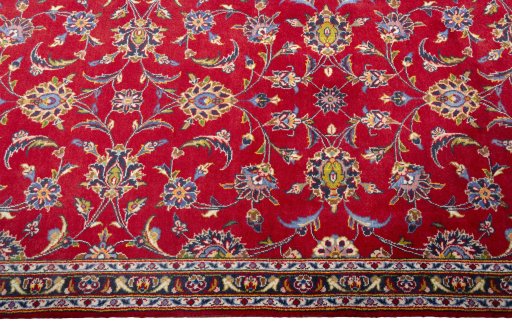 Full view of 2000s Kashan rug from Iran / Persia, 385 × 101 cm in Red tones