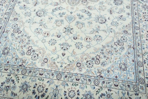 Close-up detail of 2000s Nain rug from Iran / Persia showing Wool weave