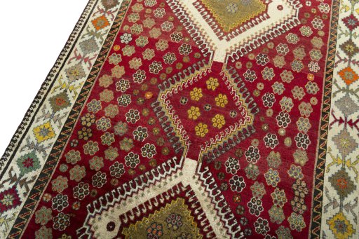 Backside of handmade 1970s Persian Gabbeh rug showing knot structure and weave density