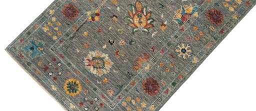 Backside of handmade New Farahan rug showing knot structure and weave density