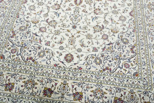 Close-up detail of 2000s Kashan rug from Iran / Persia showing Wool weave