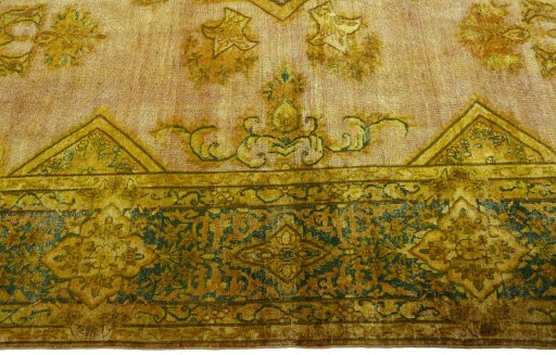 Corner detail of 1950s Vintage rug showing border pattern and Wool pile