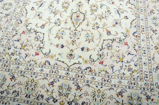 Close-up detail of New Kashan rug from Iran / Persia showing Wool weave