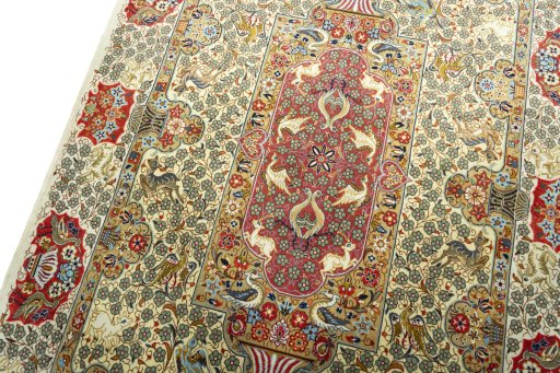 Backside of handmade New Ghom rug showing knot structure and weave density