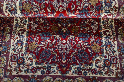 Corner detail of 2000s Jozan rug showing border pattern and Wool pile