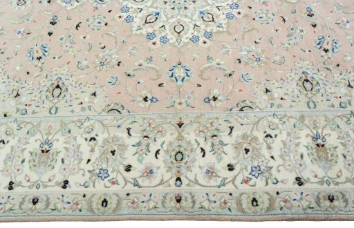 Corner detail of New Kashan rug showing border pattern and Wool pile