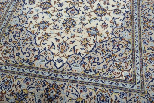 Close-up detail of 2000s Kashan rug from Iran / Persia showing Wool weave