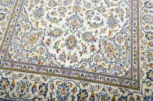 Close-up detail of 2000s Kashan rug from Iran / Persia showing Wool weave