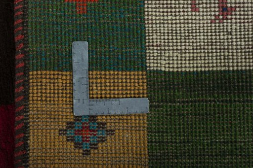 Close-up detail of 2000s Persian Gabbeh rug from Pakistan showing Wool weave