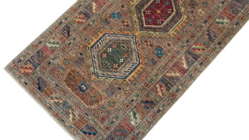 Backside of handmade New Kazak rug showing knot structure and weave density