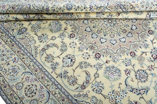 Close-up detail of 2000s Nain rug from Iran / Persia showing Wool weave