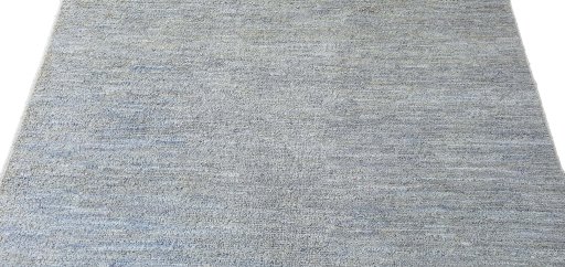 Backside of handmade New Morocco rug showing knot structure and weave density