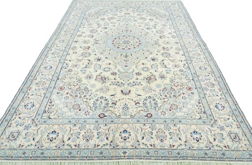 Surface texture of 2000s Nain rug with natural Wool and intricate pattern