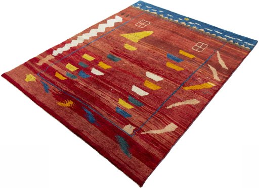 Corner detail of 2000s Persian Gabbeh rug showing border pattern and Wool pile