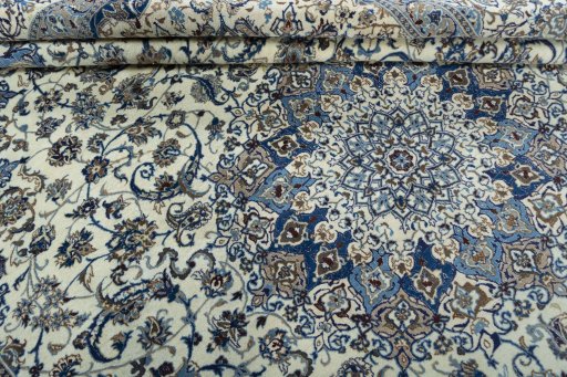 Close-up detail of 2000s Nain rug from Iran / Persia showing Wool weave