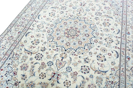 Backside of handmade 2000s Nain rug showing knot structure and weave density