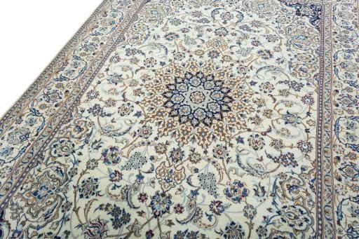 Backside of handmade 2000s Nain rug showing knot structure and weave density