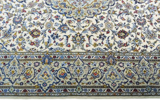 Close-up detail of 2000s Kashan rug from Iran / Persia showing Cork weave