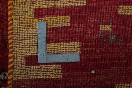 Close-up detail of 2000s Persian Gabbeh rug from Pakistan showing Wool weave
