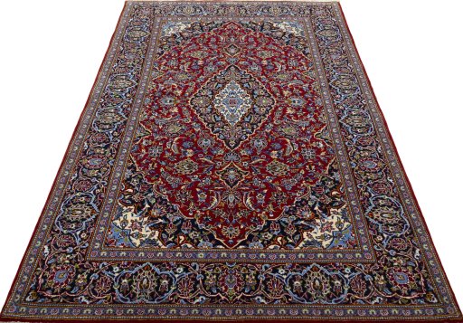 Surface texture of 2000s Kashan rug with natural Cork and intricate pattern