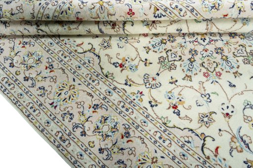 Close-up detail of New Kashan rug from Iran / Persia showing Wool weave