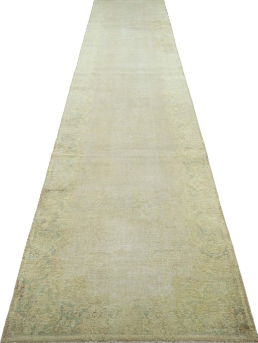 Surface texture of 1950s Vintage rug with natural Wool and intricate pattern