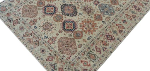 Backside of handmade New Kazak rug showing knot structure and weave density
