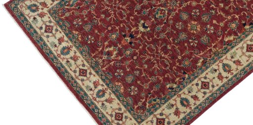 Backside of handmade New Farahan rug showing knot structure and weave density