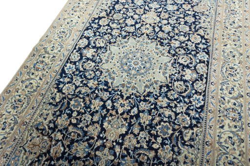 Backside of handmade 2000s Nain rug showing knot structure and weave density