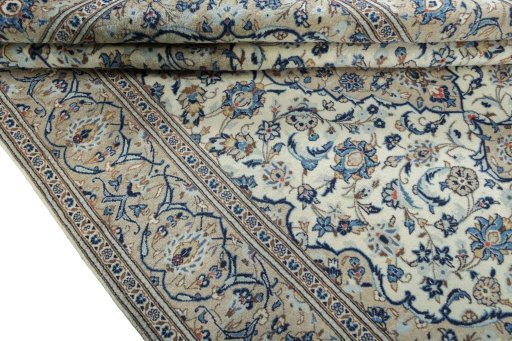 Close-up detail of 2000s Kashan rug from Iran / Persia showing Wool weave