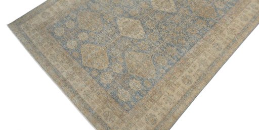 Backside of handmade New Kazak rug showing knot structure and weave density