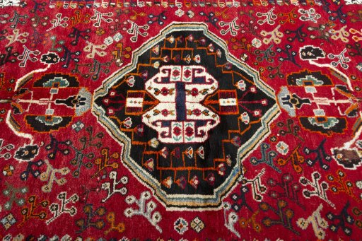 Central medallion detail of 1970s Shiraz rug from Iran / Persia