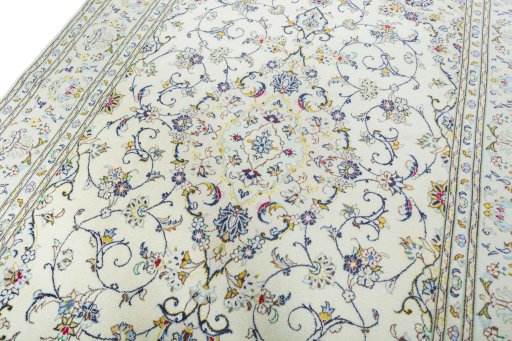 Backside of handmade New Kashan rug showing knot structure and weave density